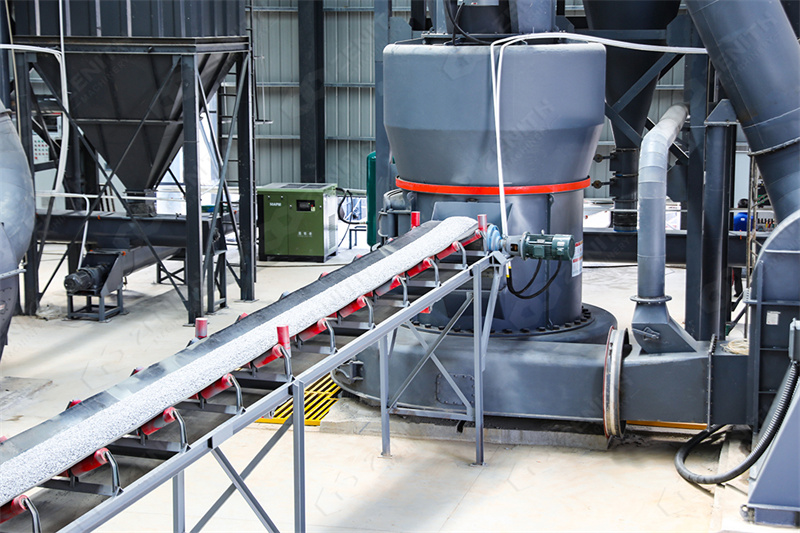 Maintenance technician servicing grinding mill bearings
