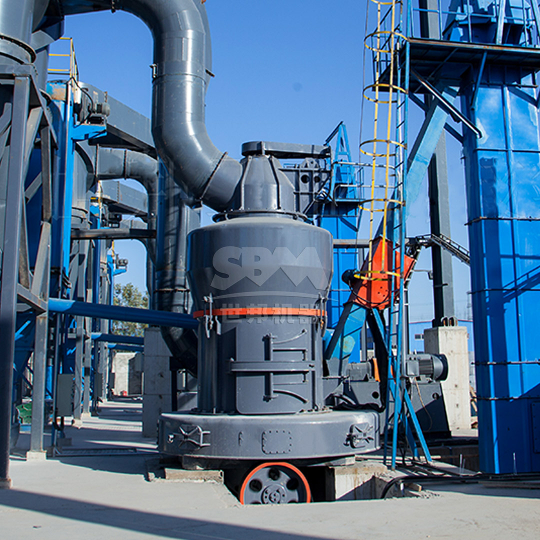 Raw limestone chunks being fed into a primary crusher